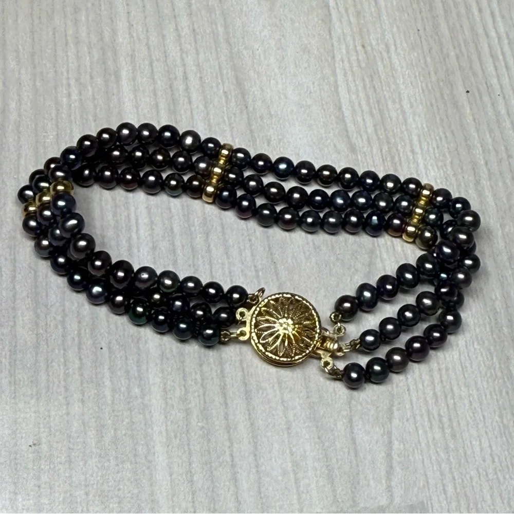 14k Yellow Gold Elegant Black Natural Multi-Strand Pearl Bracelet.
